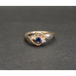 SAPPHIRE AND DIAMOND THREE STONE RING in twist setting, the central sapphire approximately 0.2cts,