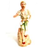 NAUTILUS PORCELAIN FIGURE THE WATER CARRIER a bearded male with various vessels on his waist band,