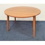 WALNUT EFFECT DINING TABLE with shaped drop flaps, standing on tapering supports, 71.5cm x 105.5cm