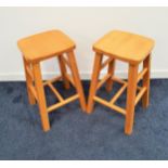 PAIR OF BEECH KITCHEN STOOLS with shaped square seats and plain supports (2)