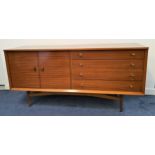 LEBUS TEAK SIDEBOARD with a rectangular top above a pair of cupboard doors and four long drawers,