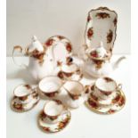 ROYAL ALBERT OLD COUNTRY ROSES tea and coffee service comprising a tea and coffee pot, sandwich