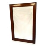 MAHOGANY RECTANGULAR WALL MIRROR with a bevelled plate, 68.5cm x 46cm