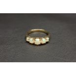 GRADUATED OPAL FIVE STONE RING on nine carat gold shank, ring size Q and approximately 3 grams