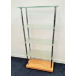 SET OF OPEN SHELVES the four opaque glass shelves with tubular steel supports and a beech base,