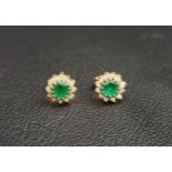 PAIR OF EMERALD AND DIAMOND CLUSTER EARRINGS in nine carat gold