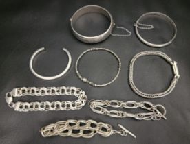 SELECTION OF SILVER BRACELETS including T-bar bracelets, fancy link bracelets, a cuff bracelet and