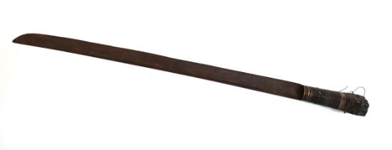 PAWIAN SWORD with a steel blade and ornate carved wood handle with two wire grip bands, overall 69cm