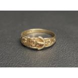 NINE CARAT GOLD BUCKLE DESIGN RING with floral decoration, ring size P and approximately 1.4 grams