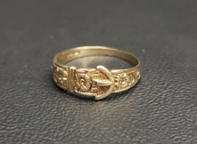 NINE CARAT GOLD BUCKLE DESIGN RING with floral decoration, ring size P and approximately 1.4 grams