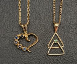 TWO GEM SET TEN CARAT GOLD PENDANTS one of heart design set with sapphires and the other with two