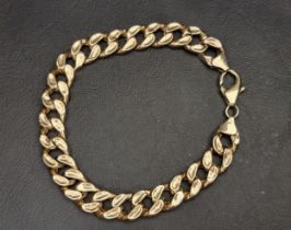 NINE CARAT GOLD CURB LINK BRACELET approximately 15.8 grams and 24cm long