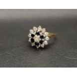 DIAMOND AND SAPPHIRE CLUSTER RING the central illusion set diamond in concentric surround of
