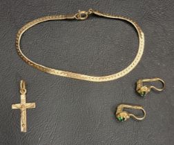 SMALL SELECTION OF GOLD JEWELLERY comprising a ten carat gold bracelet, a ten carat gold crucifix