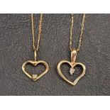 TWO TEN CARAT GOLD HEART SHAPED PENDANTS both with a single diamond and on a ten carat gold chain,