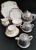 ROYAL ALBERT TEA SERVICE with a white ground decorated with flowers and gilt highlights,