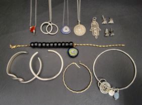 SELECTION OF SILVER JEWELLERY including cuff bracelets, pendants on chains, stud earrings, a