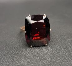 LARGE SMOKY QUARTZ SINGLE STONE DRESS RING the cushion cut quartz measuring 17.5mm x 14mm x 7.1mm,