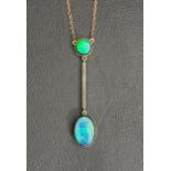 OPAL TRIPLET PENDANT un marked gold, the round opal above thin bar and further oval opal drop, on