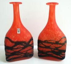 PAIR OF MDINA RED GLASS VASES with irregular black overlay, 23.5cm high