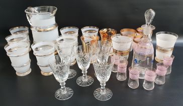 GLASS LEMONADE SET comprising a jug and seven glasses with frosted decoration and gilt highlights,