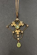 PERIDOT AND SEED PEARL HOLBEIN PENDANT early 20th century, in nine carat gold and on nine carat gold