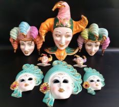 THREE POTTERY VENETIAN WALL MASKS 32.5cm, 24cm and 19.5cm high, together with five pottery Jester