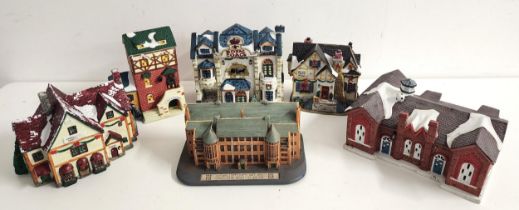 FIVE POTTERY ILLUMINATED CHRISTMAS HOUSES comprising Rose Creek Cottage, Christmas Shoppe, a part