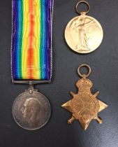 THREE WWI MEDALS comprising The 1914-15 Star, 1914-1918 War Medal with ribbon and The Great War