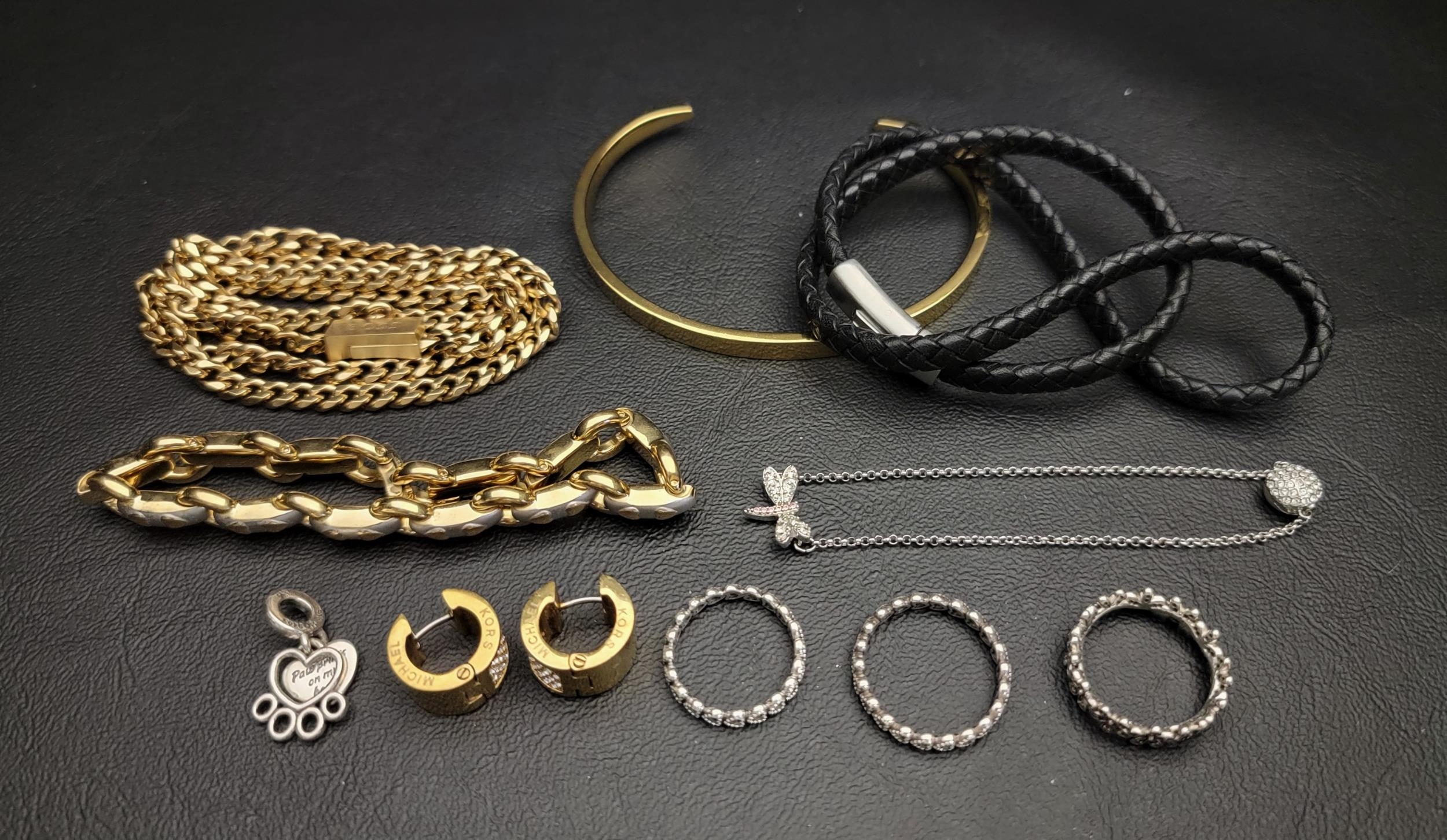 SELECTION OF FASHION JEWELLERY comprising a Emporio Armani double bracelet, a Tom Astin cuff