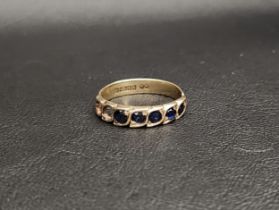 SAPPHIRE SET RING in nine carat gold, set with five sapphires (two lacking), ring size S and