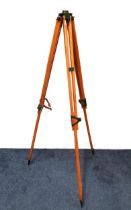 VINTAGE WOODEN TRIPOD STAND the adjustable legs with metal spikes, the top with a circular metal