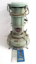 VINTAGE ALADDIN BLUE FLAME HEATER the enamelled body in unused condition, with operating