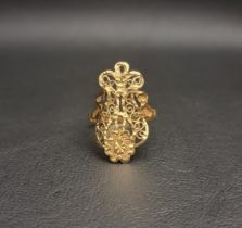 TWENTY-TWO CARAT GOLD RING the ornate style ring with a pierced design incorporating scroll work and