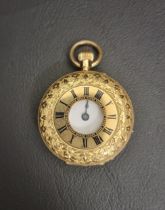 EIGHTEEN CARAT GOLD CASED HALF HUNTER FOB WATCH the front cover with central glazed panel surrounded