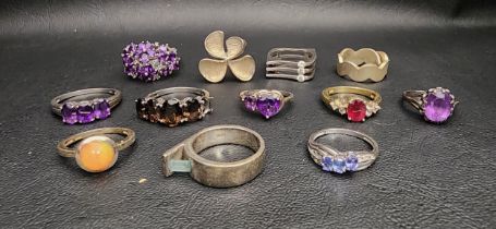 GOOD SELECTION OF TWELVE SILVER RINGS including cluster, single stone and other statement rings,