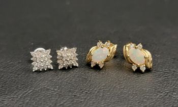 TWO PAIRS OF GEM SET EARRINGS comprising a pair of opal and diamond studs in fourteen carat gold,