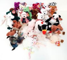 SELECTION OF THIRTY BEANIE BABIES comprising Sly, Seaweed, Cupid, Clubby, Valentina, Valentino, 2001