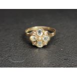 AQUAMARINE AND SEED PEARL CLUSTER RING in nine carat gold, ring size O and approximately 2.1 grams