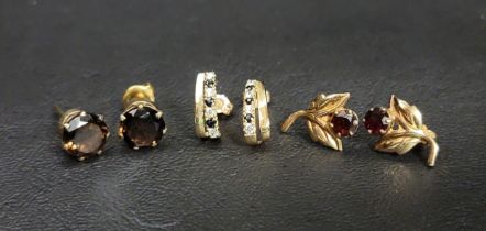 THREE PAIRS OF GEM SET NINE CARAT GOLD EARRINGS comprising a pair of smoky quartz stud earrings, a
