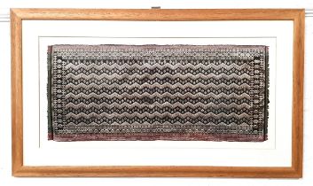 BALINESE CEREMONIAL CLOTH woven with zig-zags and stars, 34cm x 77cm, framed
