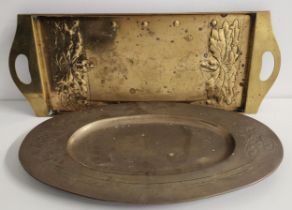 ART NOUVEAU OVAL BRASS TRAY with embossed floral decoration, standing on four ball supports, 52.