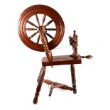 Long Kesh prisoner art, a full-size turned hardwood, working spinning wheel.