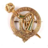 1920s Irish Free State brooch. A gilt metal pin-back brooch in the form of a penannular cloak pin