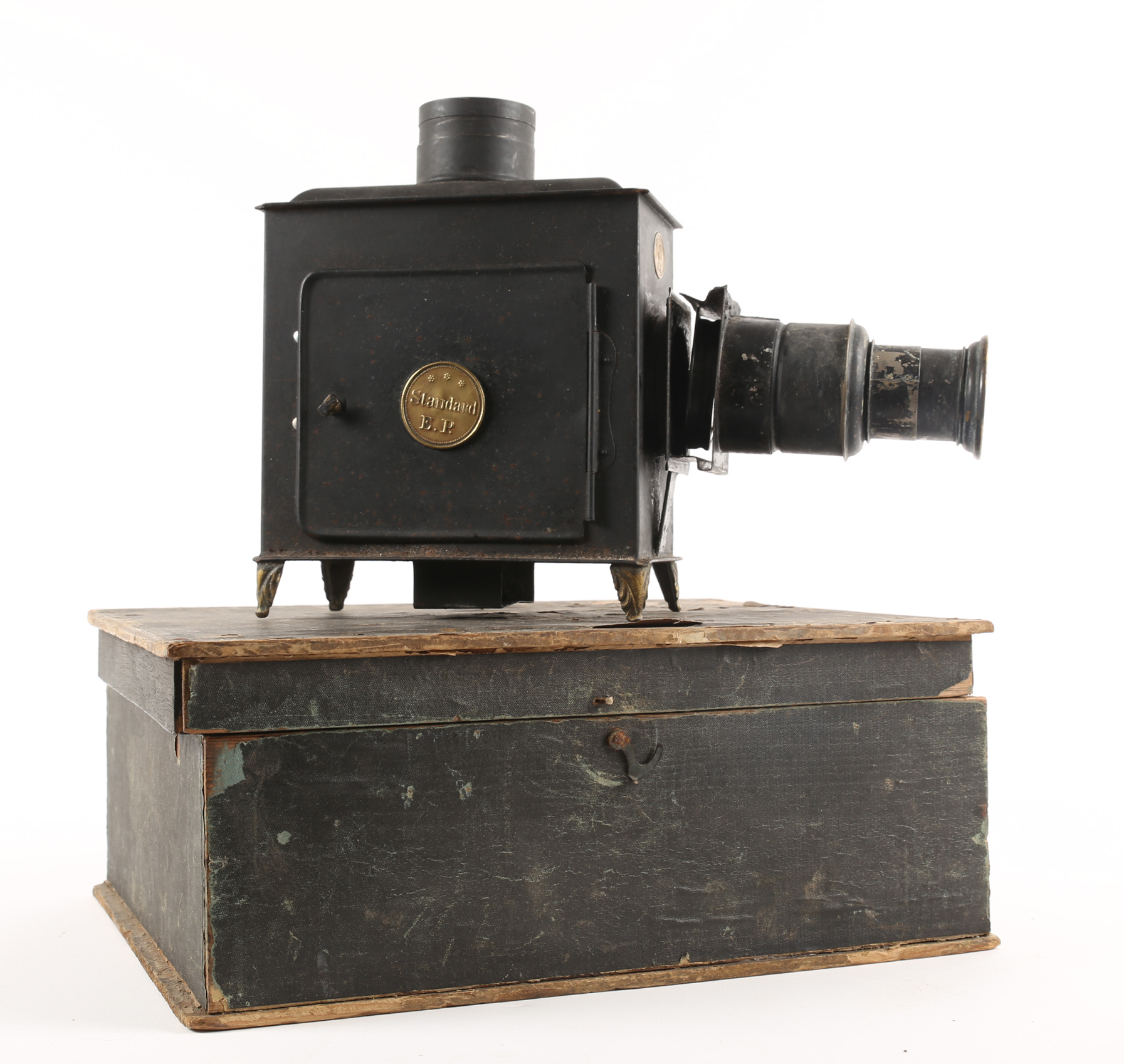 A late 19th century German tin and brass magic lantern with slides.