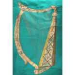 An Irish nationalist flag. A large green flag with painted gilt harp, 66" x 60".