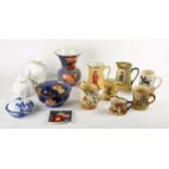 A collection of Royal Doulton porcelain ware, mainly 1930s to 1950s, including a Wild Rose vase,