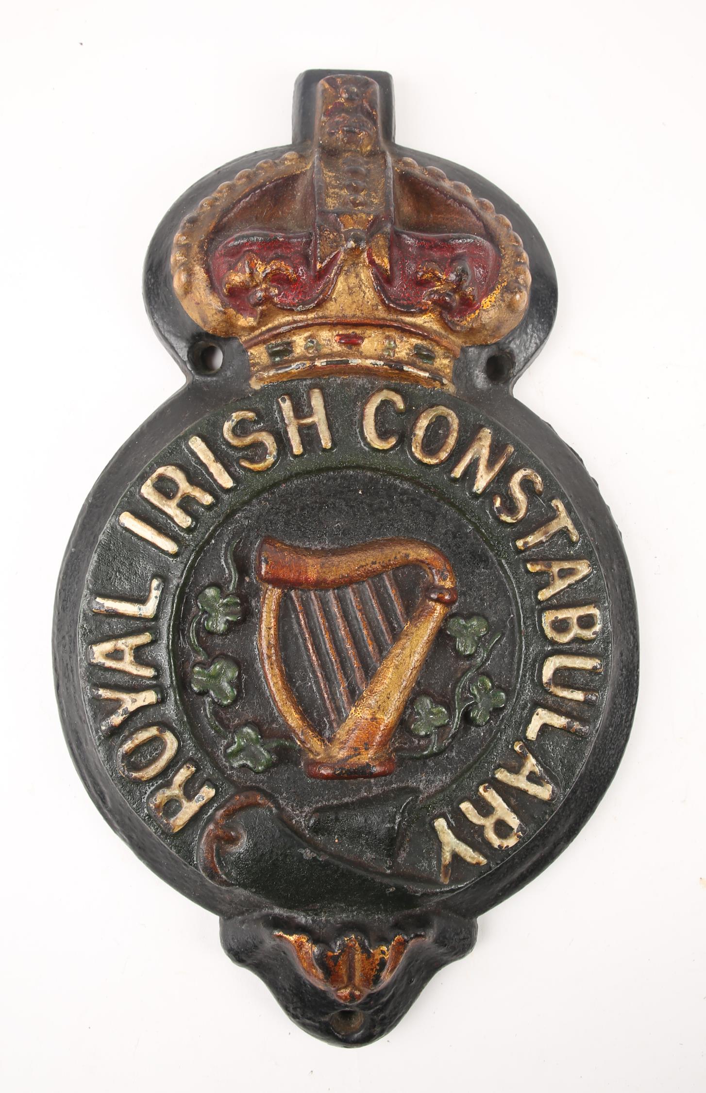 Edwardian Royal Irish Constabulary barracks sign. A painted, cast iron relief sign, the badge of the