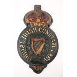 Edwardian Royal Irish Constabulary barracks sign. A painted, cast iron relief sign, the badge of the