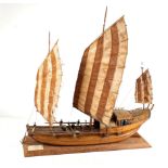 A large and impressive, early 20th century Chinese scratch-built model of a chuán or junk, rigged
